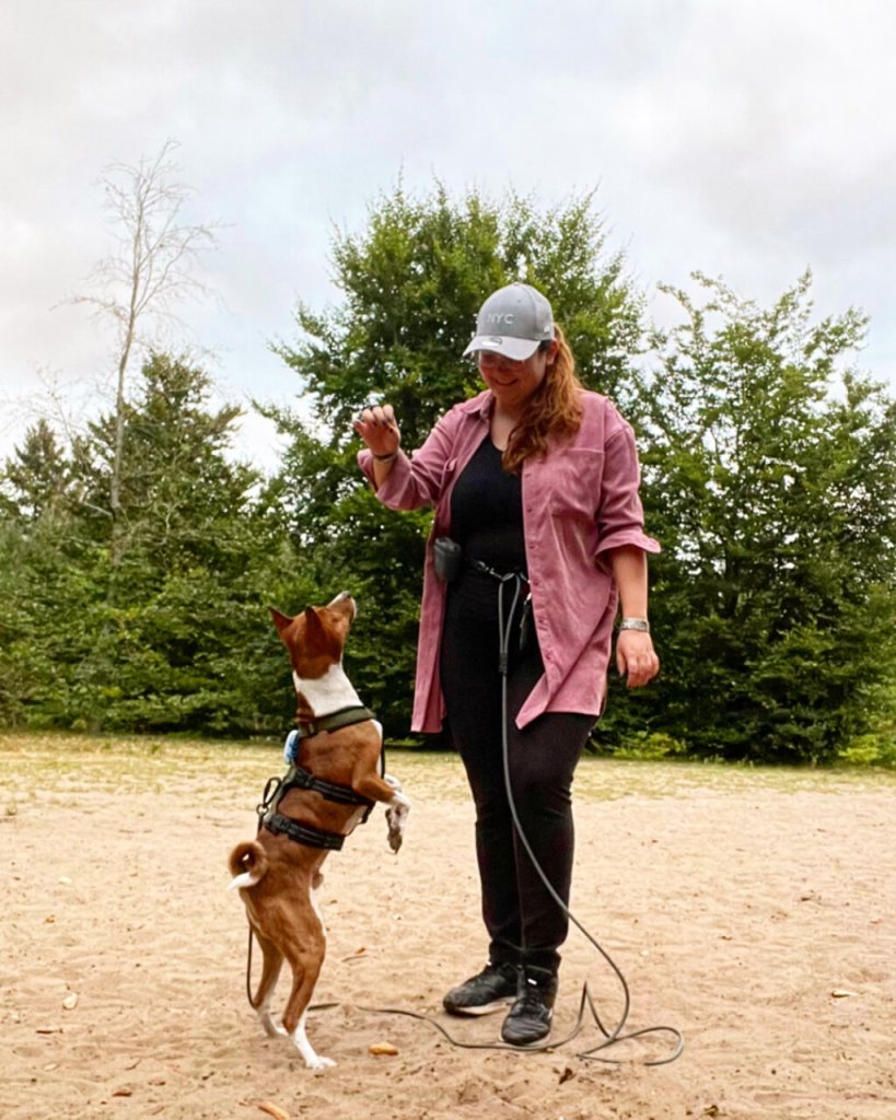 Lisa training Charlie outdoors